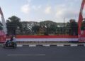 HUT RI ke-75, Tugu Malang Berselimut Bendera Merah Putih Sepanjang 366 Meter