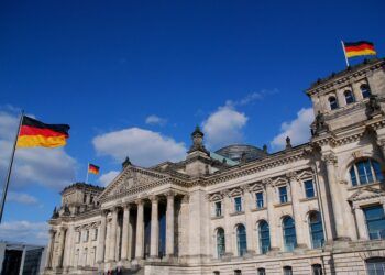 bendera negara jerman dan gedung pindah kewarganegaraan