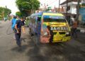 Ratusan MPU dan bus pariwisata di Tuban disemprot cairan disinfektan untuk tekan angka penyebaran COVID-19. (Foto: Moch Abdurrochim/Tugu Jatim)