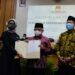 Calon Bupati dan Wakil Bupati Malang nomor urut satu, Muhammad Sanusi dan Didik Gatot Subroto, secara resmi ditetapkan sebagai Calon Bupati dan Wakil Bupati Malang terpilih oleh KPU Kabupaten Malang. (Foto: Rap/Tugu Jatim)