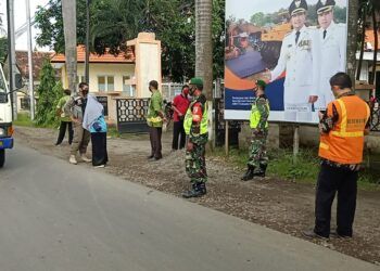 Sosialiasi terkait protokol kesehatan yang dilakukan oleh Koramil 0819/15 Winongan. (Foto: Dokumen)