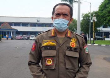 Sekretaris Satpol PP Kabupaten Malang, Firmando Matondang saat menjelaskan soal PPKM mikro. (Foto: Rap/Tugu Jatim)