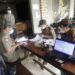 Petugas Gabungan Gelar Operasi Yustisi di Wonocolo, Surabaya 8 Tim Gabungan Polsek, Koramil, SATPOL-PP dan Kecamatan Wonocolo sedang Menjalankan Sidak di Beberapa Warung Kopi yang Berlokasi di Kecamatan Wonocolo. (Foto: Rangga Aji/Tugu Jatim)