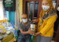 Pemberian makanan bergizi secara gratis melalui program Rantang Kasih Moe di Desa Pasinan, Kecamatan Baureno, Kabupaten Bojonegoro. (Foto: Dok PKK Desa Pasinan/Tugu Jatim)