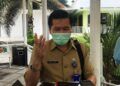 Kepala Dinas Kesehatan Kota Malang Husnul Muarif menjelaskan soal 170 orang terpapar virus Covid-19 di Panti Bhakti Luhur Malang. (Foto: Azmy/Tugu Jatim)