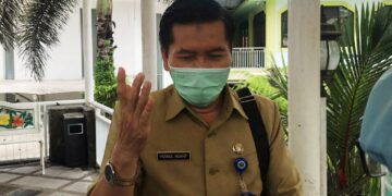 Kepala Dinas Kesehatan Kota Malang Husnul Muarif menjelaskan soal 170 orang terpapar virus Covid-19 di Panti Bhakti Luhur Malang. (Foto: Azmy/Tugu Jatim)