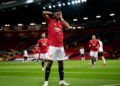 Amad Diallo merayakan Gol pembuka bagi MU, diawal babak kedua setelah babak pertama berakhir tanpa Gol. (Foto: Twitter/@Amaddiallo_19) man united ac milan liga eropa manchester united