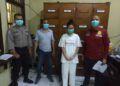 Sela Puri, tersangka muncikari atas kasus pelacuran saat diperiksa petugas kepolisian dari Polsek Blimbing, Kota Malang. (Foto : Polsek Blimbing)