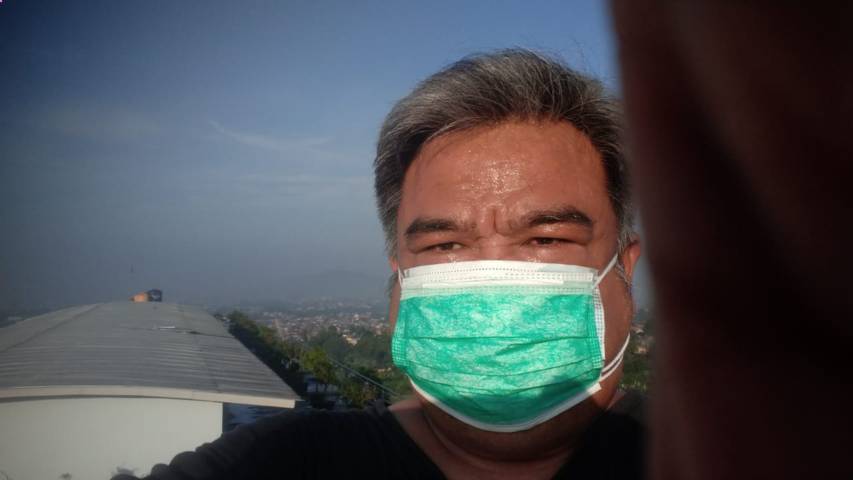 Erwin Kustiman saat melawan virus Covid-19. (Foto: Dokumen/Tugu Jatim)