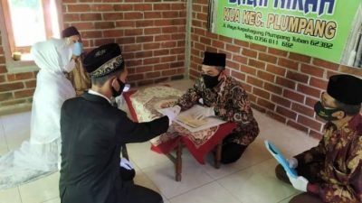 Ilustrasi akad nikah dengan menerapkan protkes di Kabupaten Tuban. (Foto: Humas Kemenag Tuban) menikah saat ppkm darurat, tugu jatim