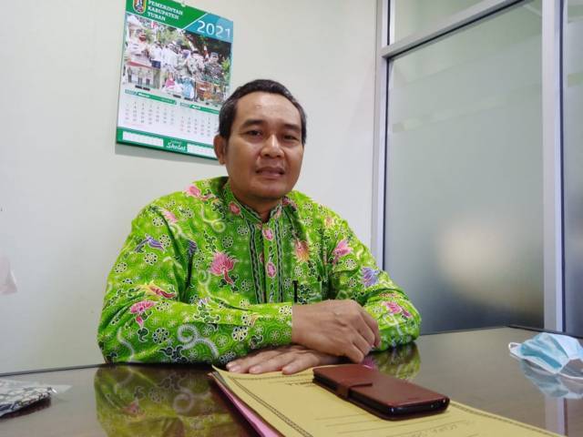 Sekretaris Komite Olahraga Nasional Indonesia (KONI) Tuban Zaenal Maftuhien saat ditemui pada 8 Juni 2021 (Foto: Rochim/Tugu Jatim)