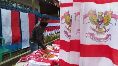 Kadir, salah seorang pedagang bendera di Kota Batu, yang ikut terdampak kebijakan PPKM Level 4 di Kota Batu. (Foto:Azmy/Tugu Jatim)