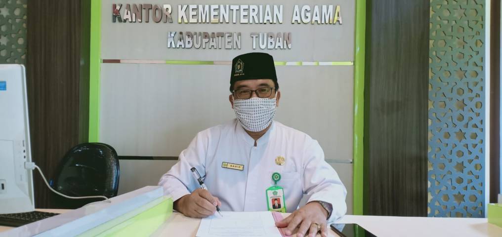 Kepala Kantor Kementerian Agama Kabupaten Tuban, Sahid saat ditemui di rungannya. (Foto: Humas Kemenag Tuban) kemenag tuban pendaftaran haji tugu jatim