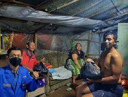 PC PMII Kota Malang Bagikan Sembako di Bantaran Sungai Brantas