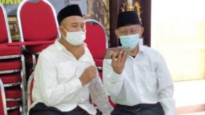 Dua terdakwa korupsi BOP Madin, Rinawan dan Nurdin, saat mengikuti sidang secara daring di Lapas Pasuruan, Senin (20/12/2021).