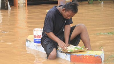 Foto-foto banjir Pasuruan. (Foto: Laoh Mahfud/Tugu Jatim)