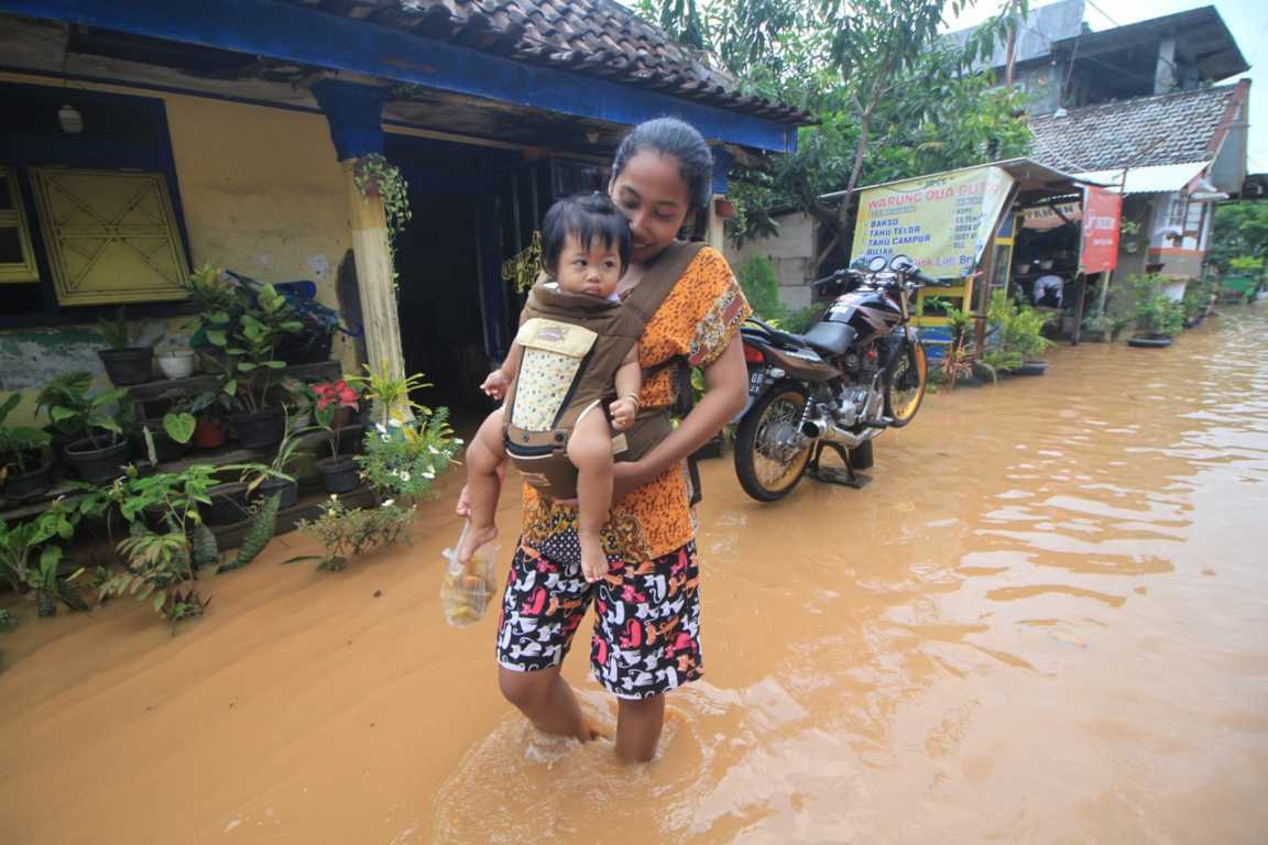 Banjir Pasuruan. (Foto: Laoh Mahfud/Tugu Jatim)