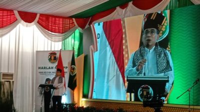 Ketua Umum PBNU, KH Yahya Cholil Staquf, memberikan arahan saat menghadiri acara Harlah PPP di Kota Malang, Minggu (27/3/2022).