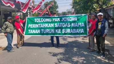 Tuntut Surat Ijo Jadi SHM, Warga Surabaya Bentangkan Banner Sambut Kunjungan Kerja Jokowi