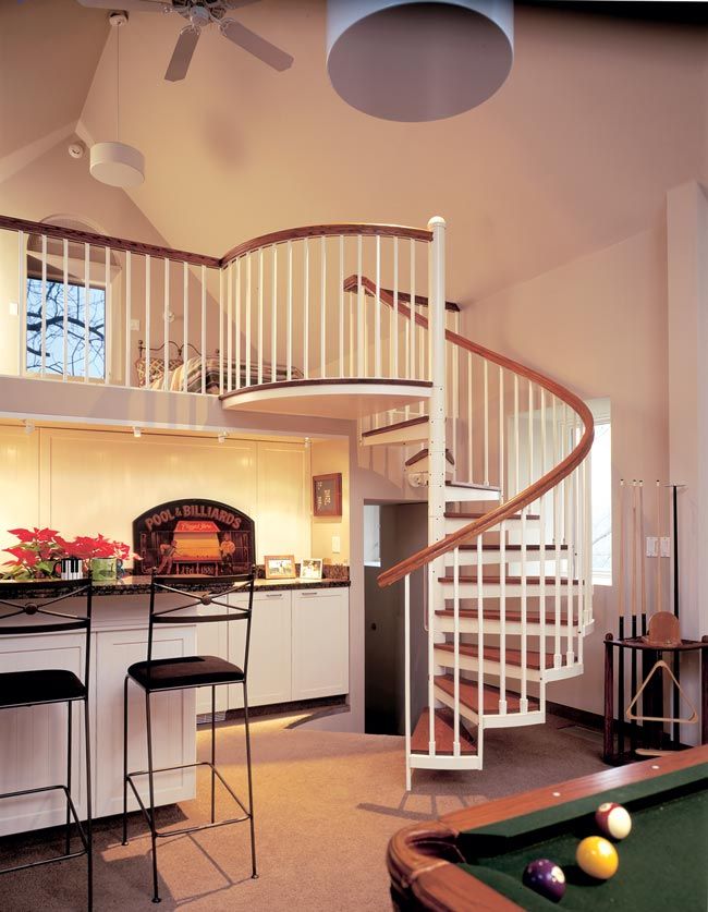 5 Rekomendasi Desain Tangga Rumah Sempit Sederhana 1 Desain tangga spiral. Foto: Pinterest @The_Iron_Shop
