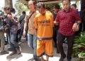Tersangka pembunuhan.