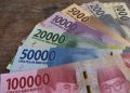 Penukaran uang baru.