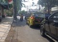 Mobil Plat Merah