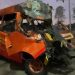 Mobil travel vs truk.