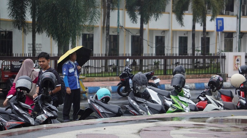 Juru parkir.