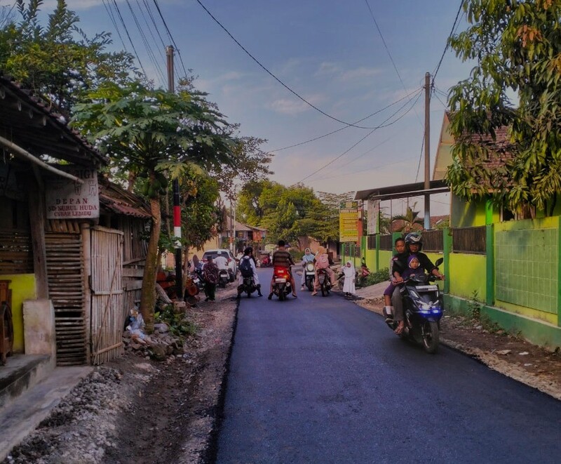 Rusak Menahun, Warga Curah Lembu lewati Jalan Beraspal berkat TMMD Jember Ke-124 1 TMMD Jember.