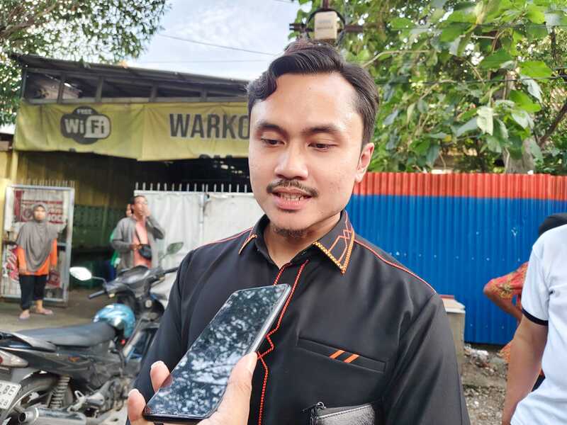 DPRD Surabaya soal aturan tap parkir.
