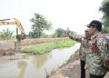 Normalisasi sungai.