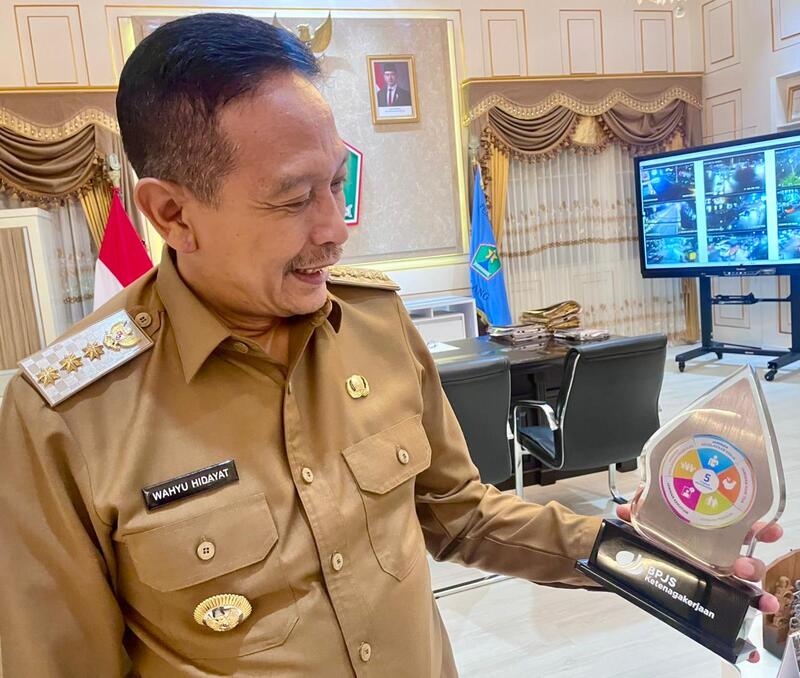 BPJS Ketenagakerjaan sopir angkot Malang.