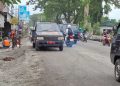 Peninggian jalan.